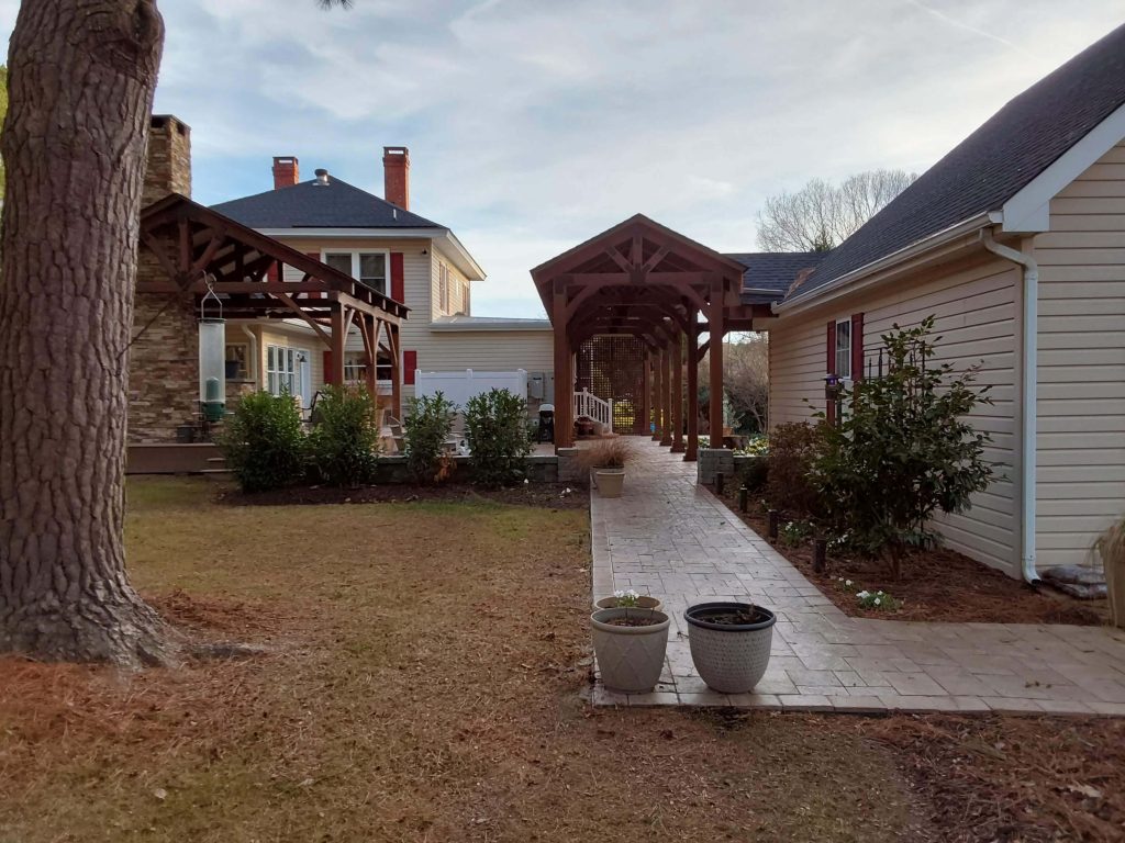 Outdoor breezeway leading to back of guest house