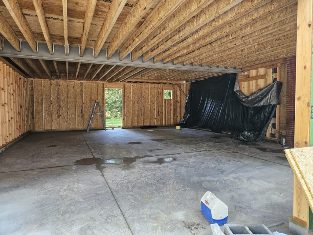 Steel Beam in place with inside of 2nd floor framing